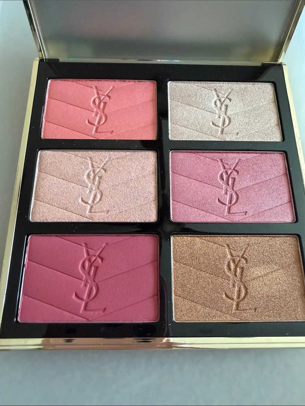 Yves Saint Laurent touched saint come